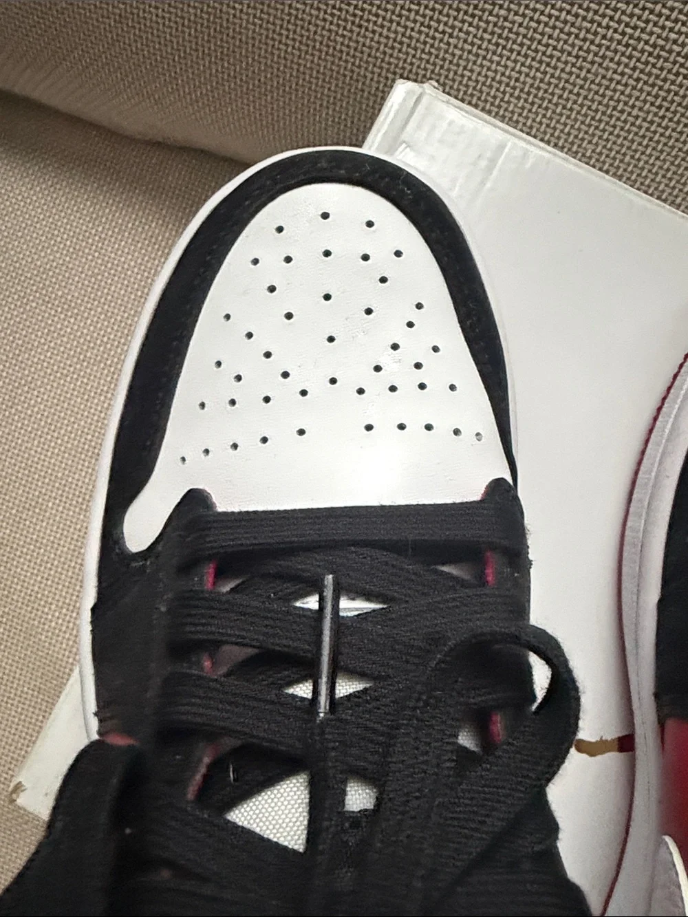 Jordan Low-Top Sneakers in White, Black & Red